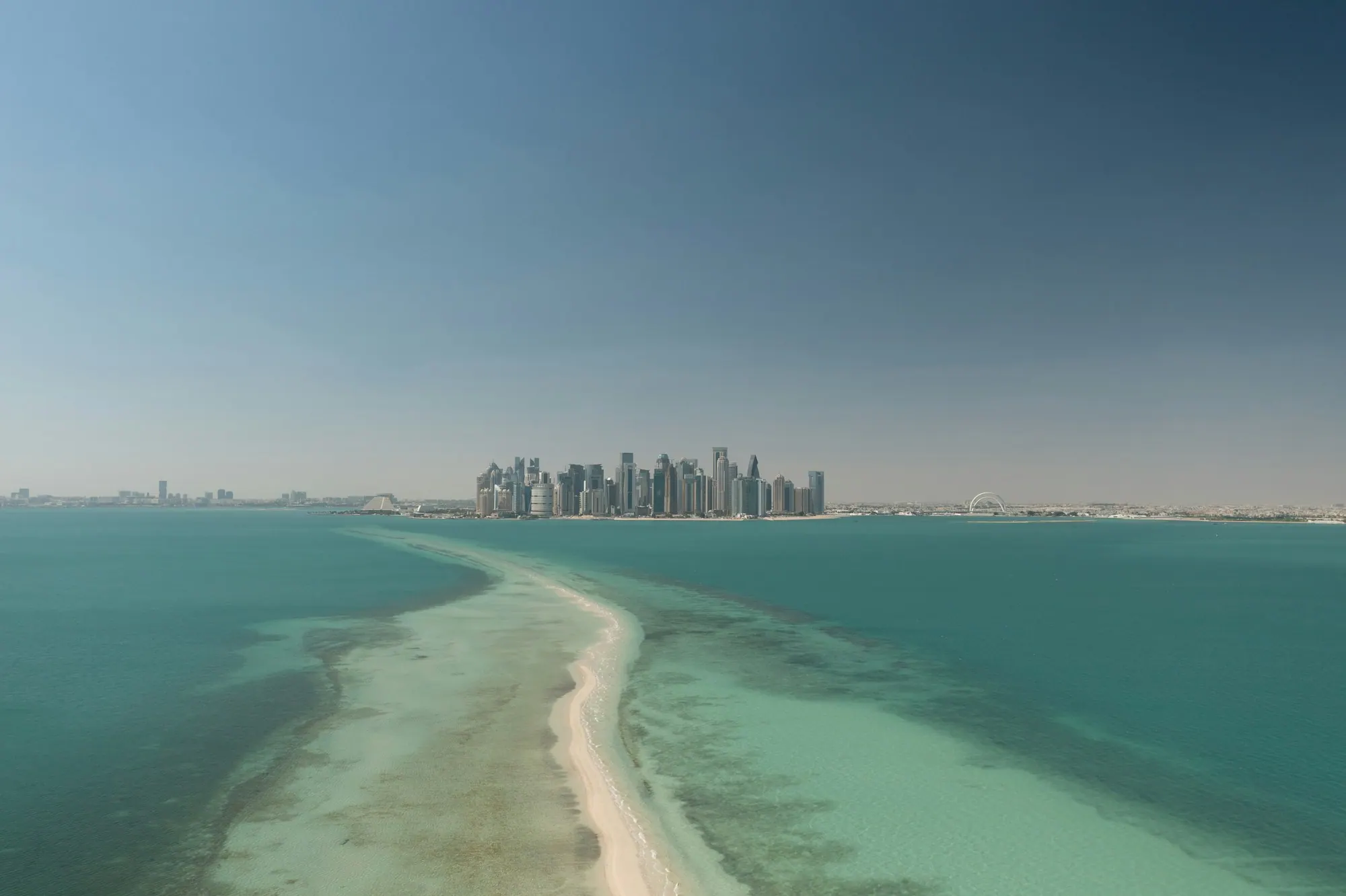West Bay skyline in Doha, Qatar, seen from the beach and Corniche